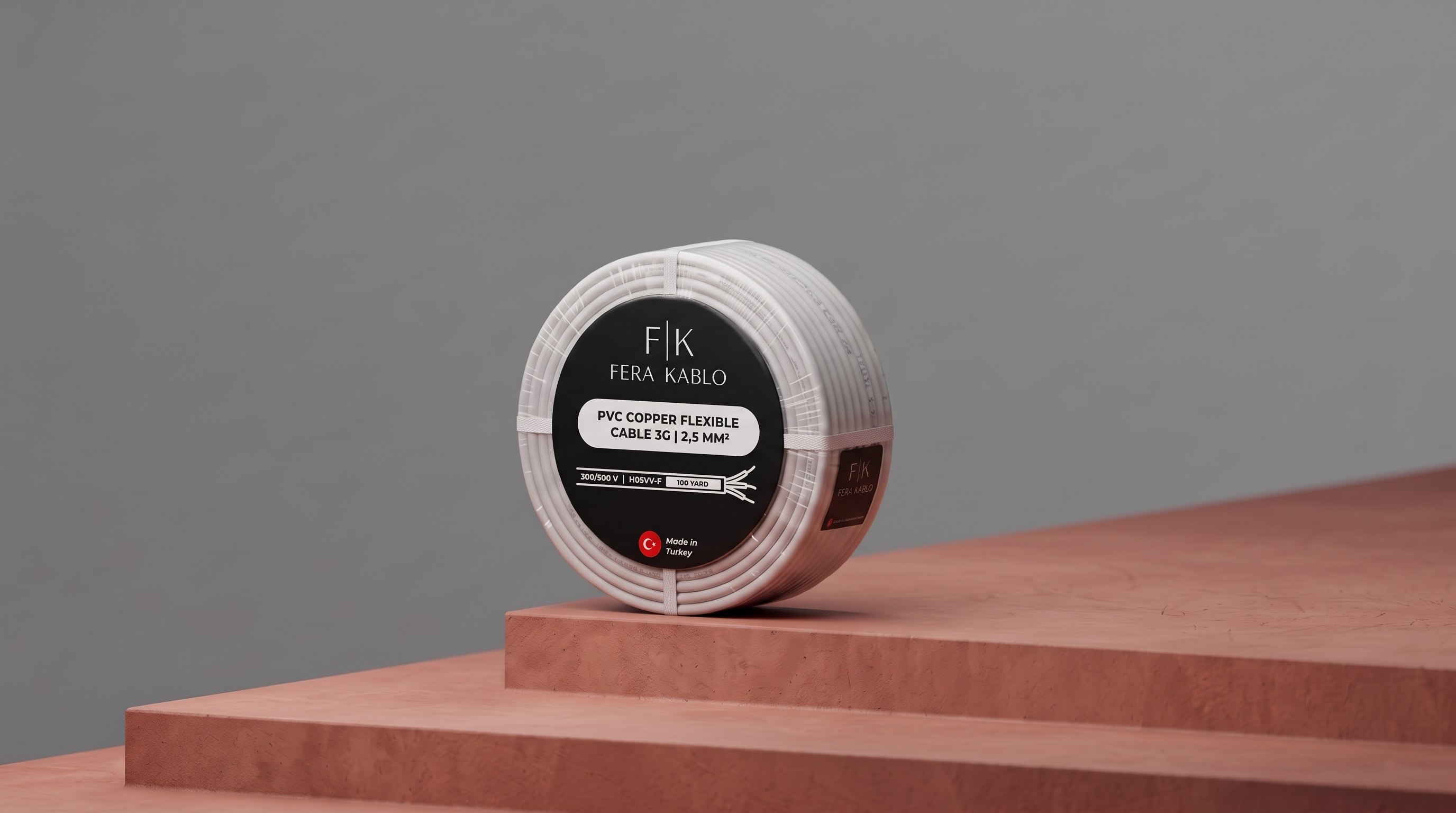 Coil of Fera Kablo PVC copper flexible cable on a terracotta step