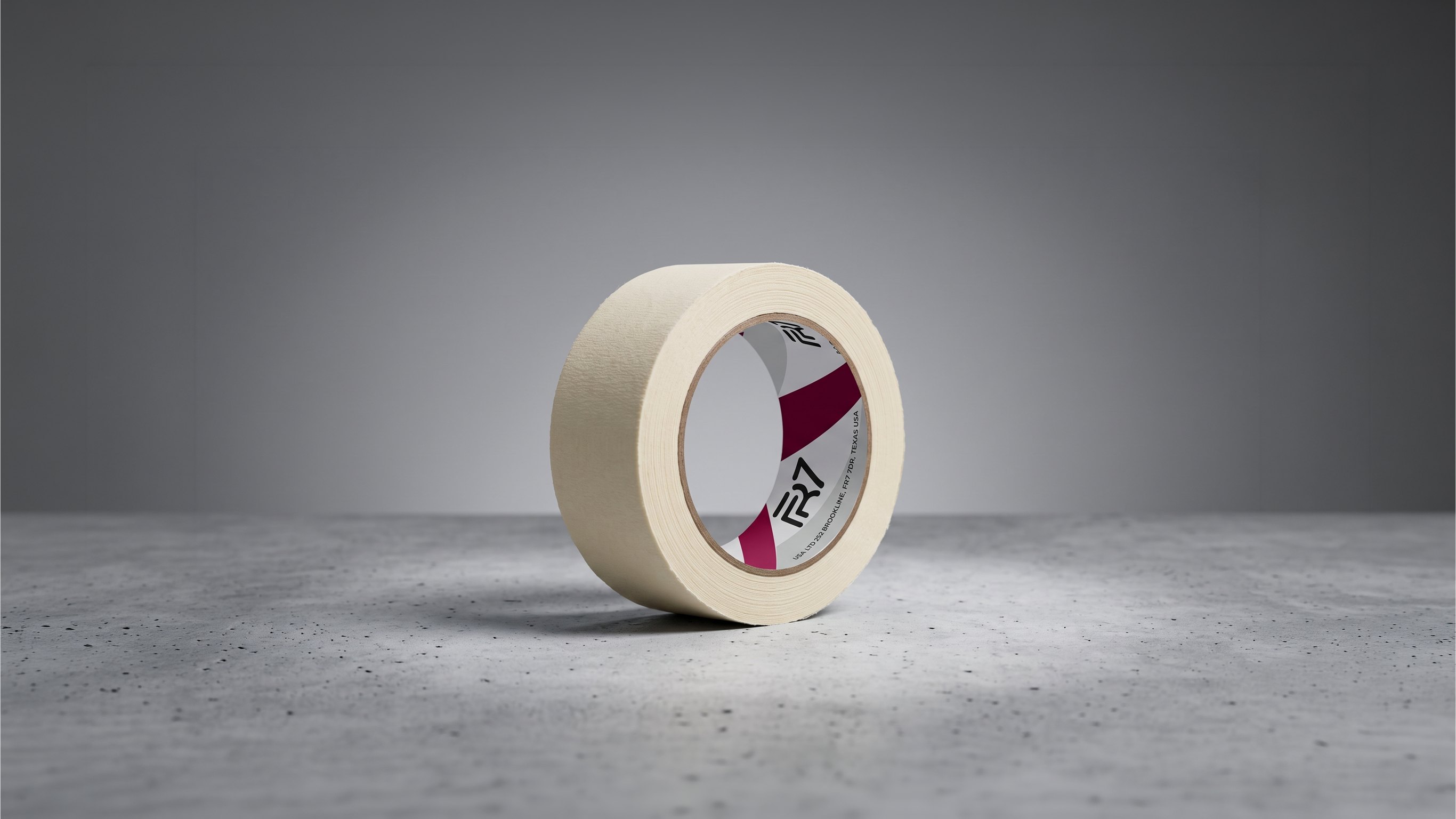 FR7 masking tape roll standing on concrete